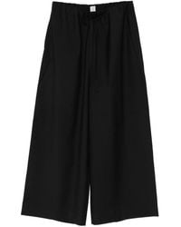 TOTEME - Wool Drawstring Trousers - Lyst
