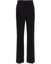 TOTEME - Flared Trousers With Stretched Pleat And Tailored Fit - Lyst