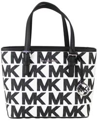 Michael Kors Leather Jet Set Graphic Optic White Xs Top-zip Tote Crossbody  Bag in Black - Save 16% | Lyst