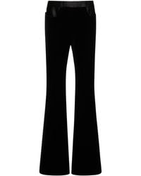Tom Ford - Pantaloni vita bassa in velluto di cotone - Lyst
