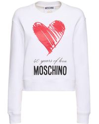 Moschino - Felpa in jersey di cotone con logo stampato - Lyst