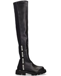 Womens Shoes Boots Over-the-knee boots Love Moschino Rubber Side Logo Over The Knee Boot in Black Save 4% 