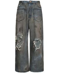 Balenciaga - Jeans anchos con rotos - Lyst