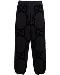 Gucci - Pantalon de survêtet en coton floqué gg - Lyst