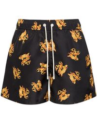 Palm Angels - Shorts mare in techno monogram - Lyst