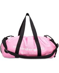 - Save 1% Pink Alexander Wang Synthetic Primal Drawstring Nylon Duffle Bag in Neon Bubblegum Womens Bags Duffel bags and weekend bags 