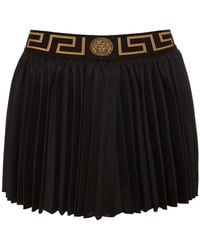 Versace - Mini-jupe plissée à jacquard Greca - Lyst