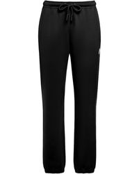 Moncler - Pantaloni in felpa di cotone con logo - Lyst