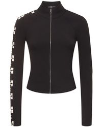 Tory Sport - Crop top in misto techno / mezza zip - Lyst