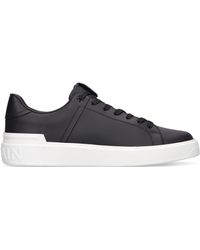 Balmain - Sneaker con logo patch nero e bianco - Lyst