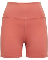 Damen Bekleidung Kurze Hosen Mini Shorts GIRLFRIEND COLLECTIVE Radlerhose Mit Hohem Bund in Lila 