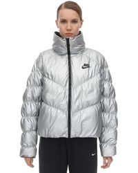 Nike Padded and down jackets for Women - Up to 66% off at Lyst.com
