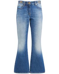 Versace - Ausgestellte Jeans Aus Denim - Lyst