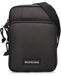Balenciaga - Explorer Logo-appliquéd Padded Nylon Messenger Bag - Lyst