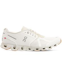 on cloud shoes white sand