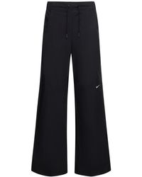Nike - Pantalones anchos de algodón - Lyst