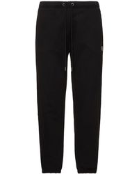 Moncler - ロゴパッチ付きコットン トラックパンツ - Lyst