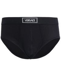 Versace - Calzonzillos slip de jersey de algodón con logo - Lyst