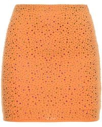 Leslie Amon - Embellished stretch tech mini skirt - Lyst