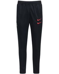 nike swoosh tape track