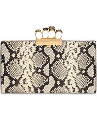 Alexander McQueen Clutch Mit Schlagring Und Pythondruck - Mettallic