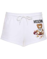 Moschino - Logo Printed Cotton Shorts - Lyst