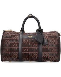 Moschino - Logo Nylon Jacquard Duffle Bag - Lyst