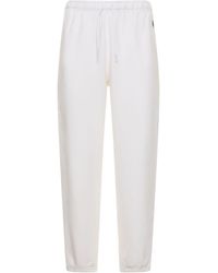 Polo Ralph Lauren - Pantaloni in jersey con logo - Lyst