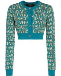 Versace - Cardigan court en maille jacquard à logo - Lyst
