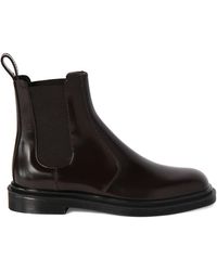 The Row Canal Leather Ankle Boots in Black | Lyst