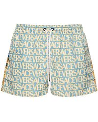 Versace - Shorts mare vacanza heritage in nylon stampato - Lyst