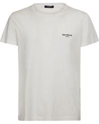 Balmain - T-shirt In Cotone Organico Con Logo Floccato - Lyst
