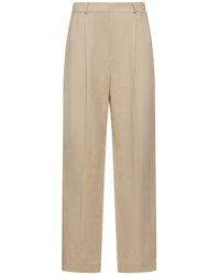 Totême - Pleated Tailored Linen Blend Pants - Lyst