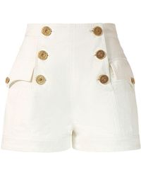 Balmain - Pantalones cortos de mezclilla blancos con botones - Lyst