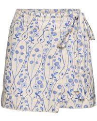 Agua Bendita - Luna Printed Mini Wrap Skirt - Lyst