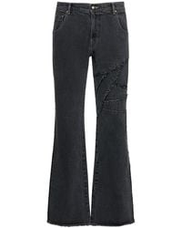 ANDERSSON BELL - Jeans svasati ghentel a taglio vivo - Lyst