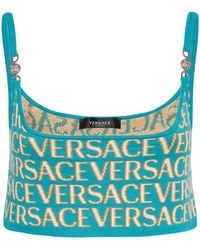 Versace - Crop top in maglia con logo jacquard - Lyst