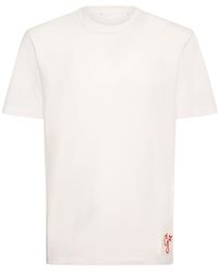 Golden Goose - T-shirt regular fit in jersey di cotone distressed - Lyst