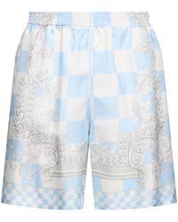 Versace - Shorts in twill di seta stampata - Lyst