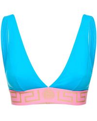 Versace - Top bikini a triangolo con logo - Lyst