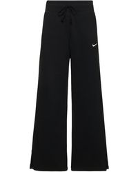 Nike - Pantaloni larghi vita alta in misto cotone - Lyst