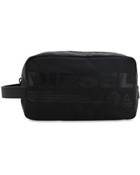 Neceseres DIESEL de hombre desde 60 €