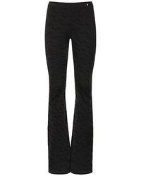 Versace - ビスコースニットフレアパンツ - Lyst