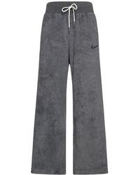 Nike - Pantaloni larghi vita alta in spugna - Lyst