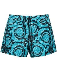 Versace - Shorts mare in nylon stampa barocco - Lyst