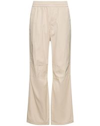 Burberry - Coated Cotton & Tech Pants - Lyst