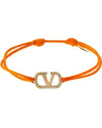 Valentino Garavani Valentino Garavani Crystal V Logo Slim Adjustable Bracelet - Orange