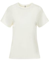 Totême - T-shirt en coton à coutures incurvées - Lyst