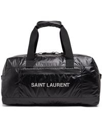 Saint Laurent - Logo-print Glossed-nylon Duffle Bag - Lyst