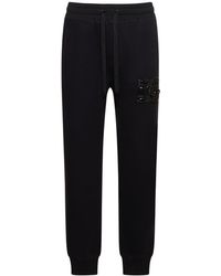 Dolce & Gabbana - Pantaloni in felpa di cotone con pietre - Lyst
